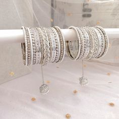 2 Midi stacks of luxurious silver bangles with a pop of white Finished with a pearl & crystal jhumka drop bangle. Perfect for reception brides or those wanting to make a statement. Ready to Ship! White Bangles Set, White Bangles, Reception Bride, What In My Bag