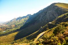 a scenic view of mountains and valleys from the top of a hill in the middle of nowhere