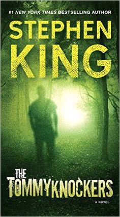 the tommy knockers by stephen king is shown in front of a dark green forest