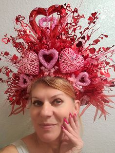 Valentine's day is every day! Be ready If you want to impress your love one this red and pink headdress is for you!  Or if you just want to look different today this glamorous headdress made you feel Queen of Heart  Crown decorated with red and pink, big and small hearts, sparkly spikes, mesh, beads, sequin...   Lightweight with elastic in the back.... fits most heads. Colors of the crown might be slightly different from the pictures you see due to your monitor setting. Venison mask with feathers not included. Item sent by USPS next business day. Check my store for other fun crowns. Let me know if you are looking for a specific one. NO returns, NO refunds, but please let me know if something is wrong with your item. Thank you for your interest in my design. Have a wonderful day! Queen Of Hearts Crown, Mask With Feathers, Queen Of Heart, Pokemon Jewelry, Crown Pink, Heart Crown, Costume Hats, Red Hearts, Pink And Red