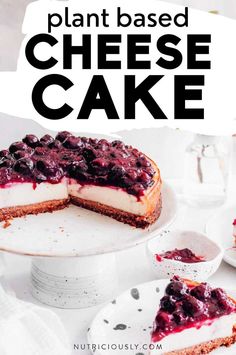 a cheesecake with blueberries on top and the words plant based cheese cake above it