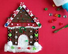 a gingerbread house is decorated with candy and candies