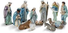 a group of figurines depicting the birth of jesus