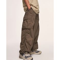 Similar cargo pants:   Summer Wide-Leg Beige Cargo Pants Get Down to Business with Stylish Functionality! 👔🔧 Discover the Power of Cargo Pants, Work Hard, Dress Smart! 🔥👖 Elevate Your Style Game with Durable Cargo Pants. From the Workshop to the Runway! 🛠️🌟 Unleashing the Style Potential of Cargo Pants Featuring multiple pockets and reinforced stitching, our cargo pants offer ample storage for your tools and essentials, ensuring easy accessibility and convenience. The adjustable waistband Men Loose Fit Style, Parachute Baggy Pants Outfit, Men’s Baggy Cargo Pants, Where To Buy Parachute Pants, Baggy Clothing Men, Parachute Pants Outfit Men, Parachute Pants Mens, Gorpcore Pants, Baggy Cargo Pants Men