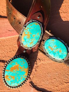 My love for old leather began when I moved out West. I search the world over, through barns saddle shops and ranches, for old retired saddle leather. This leather is the backdrop for my "Wild West" vintage leather belts! Shown here with perfect Kingman Turquoise oval concho, on 3 inch wide vintage leather. These look amazing with any of our Mas Grande Turquoise buckles. These belts sport two conchos measuring around three inches each! Buckles are sold separately. Some of this leather is over 100 Hand Tooled Leather Belt Buckles For Ranch, Artisan Leather Belt Buckle With Antique Design, Rustic Leather Belt For Rodeo, Rustic Leather Belt Buckles For Ranch, Rustic Leather Belt Buckles For Rodeo, Rustic Concho Belt Buckles For Rodeo, Rustic Distressed Brown Belt Buckle With Antique Design, Rustic Concho Belts For Rodeo, Rustic Hand Tooled Belt For Western-themed Events