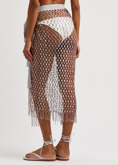 Long Description#Info & Care# Missoni knitted sarong  Open-knit, metallic weave, sequin embellishments, embroidered inserts, fringed hem Tie fastening  80% viscose, 10% polyester, 10% polyamide Dry clean  #Size & Fit# Length waist to hem: 35 inches/ 89cm; 2: 37 inches/ 94cm  Midweight  Slim across the waist, loose fit  One size; will comfortably wear a size UK6-UK14 Knit Sarong, Woven Wrap, Open Weave, Open Knit, Sarong, Missoni, Embellishments, Sequin, Loose Fitting