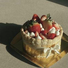 a pastry with strawberries and marshmallows on top