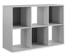 a white bookcase with four sections on the front and one section on the back