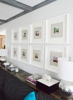 a living room with pictures on the wall and an instagramr for pinter