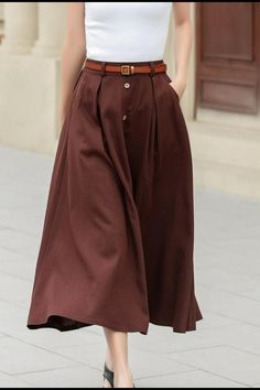 A stylish midi linen skirt in a sophisticated brown hue, featuring a trendy button front design that exudes elegance. Perfect for any event, this versatile piece is a must-have for fashion enthusiasts. 🤎 

SKU 4949 

#FashionForward #StylishChoices #OutfitIdeas #FashionMustHave #LinenFashion #Xiaolizi Elegant Brown Full Skirt Bottoms, Workwear Bottoms With Button Closure And Midi Length, Chic Midi-length Bottoms With Buttons, Chic Midi Length Bottoms With Buttons, Fall Wide Leg Skirt With Buttons, Elegant Linen Bottoms With Buttons, Elegant Buttoned Flared Maxi Skirt, Elegant Flared Maxi Skirt With Buttons, Workwear Maxi Skirt With Button Closure