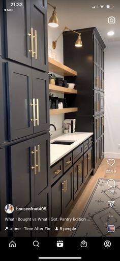 a kitchen with black cabinets and white counter tops is shown on the app store's homepage