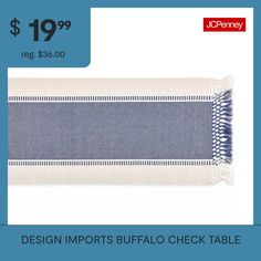 a blue and white striped table runner with the price $ 19 99