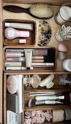 an open drawer containing cosmetics and other personal care items