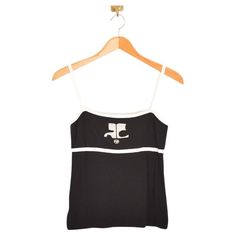 Chic Vintage Courrèges knitted vest top in a black & white monochromatic colour way with slim shoulder straps and Iconic Logo detailing. Features; Timeless Design Courreges 21 Japanese licensed label Stretchy Knitted material Sizing; Pit to Pit; 15'' - 18'' Top of shoulder to Hem; 20'' Recommended Size; UK 8-12 Vintage Courreges, Monochromatic Colour, Andre Courreges, Cristobal Balenciaga, Knitted Vest, Iconic Logo, Models Off Duty, Chic Vintage, Harper's Bazaar