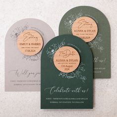 three wooden wedding cards with floral designs on them