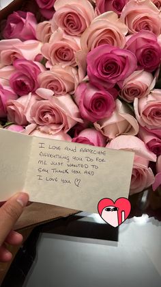 someone is holding a bouquet of pink roses with a note in front of them that says love and affection