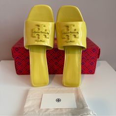 Tory Burch Eleanor 55mm Logo-Plaque Mule Heels Size Us 8 Color Lime Yellow New In Box Comes With Dustbag Nappa Leather Calf Leather Patent Finish Slip-On Style Branded Leather Insole Square Open Toe 55mm Mid Block Heel Composition Sole: Calf Leather 100% Lining: Nappa Leather 100% Outer: Patent Leather 100% Designer Patent Leather Flat Sandals, Designer Patent Leather Sandals With Flat Heel, Luxury Tan Heels For Summer, Designer Open Toe Tan Heels, Designer Tan Open Toe Heels, Designer Tan Flat Heel Sandals, Bison Board, Mule Heels, Lime Yellow