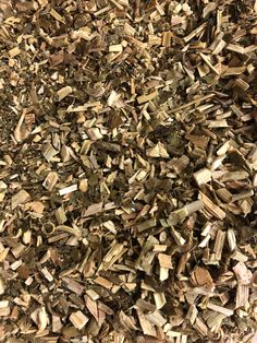 a pile of wood chips sitting on top of a table