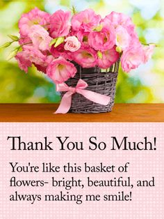 pink flowers in a basket on a table with the words, thank you so much