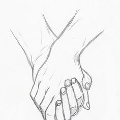 two hands are holding each other's hand