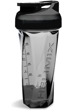 the blender bottle has a black lid and is filled with liquid, water, and other things