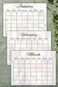 two calendars with the words january and march on them, next to some flowers