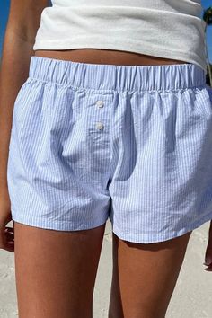 Details: Boxer style shorts Elastic waistband Faux buttons Light blue striped design Size Guide: S: 0-2 M: 4-6 L: 8-10 Wash and care: 100% Polyester Hand wash cold, hang to dry Summer Shorts Women, Brandy Shorts, Women Vacation, Clothing Wishlist, Beach Vacation Outfits, Womens Summer Shorts, Maxi Romper, Pants Summer, Beach Outfits