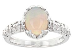 0.95ct Oval Ethiopian Opal Rhodium Over Sterling Silver Ring. Measures Approximately 0.88"L x 0.42"W. Not sizeable. Silver Oval Opal Ring Fine Jewelry, Fine Jewelry Silver Opal Ring In Oval Shape, Ethiopian Opal Jewelry, Opal Jewelry, Ethiopian Opal, Sterling Silver Ring, Silver Ring, Sterling Silver Rings, Opal