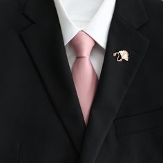 Tie Mood's modern satin skinny neck ties come in a variety of colors to match your dapper wardrobe. The easy to wear neck tie is the perfect accent to your look. Can be paired with BHLDN's Dusty Rose Bridesmaid Dresses Color: Dusty Rose Imported and Handmade Material: Polyester Width: approx. 2.25 in/6 cm Length: approx. 56 in/145 cm Elegant Pink Groom's Suit, Classic Pink Suit And Tie Accessories For Wedding, Elegant Pink Wedding Suits, Dusty Rose Groomsmen Attire, Black Suit Pink Tie, Black And Dusty Rose Wedding, Dusty Rose Wedding Theme, Dusty Rose Tie, Black Prom Suits