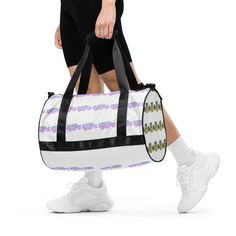 Ready to get your fitness on? Add some punch to pumping iron with this all-over print gym bag. Made from 100% polyester and sturdy, water-resistant fabric, this bag is fun meets function. And it's got pockets!  * 100% polyester * Fabric weight: 9.91 oz/yd² (336 g/m²)  * Water-resistant and durable  * Sturdy fabric with fusible backing to add firmness  * T-piping for stability  * Dual padded handles  * Inside pocket for valuables Sporty White Duffle Bag For School, Casual White Duffle Bag For Gym, White Sporty Duffle Bag For Gym, Functional White Gym Bag, Pumping Iron, Baby Print, 90s Baby, Gym Bags, Duffel Bags