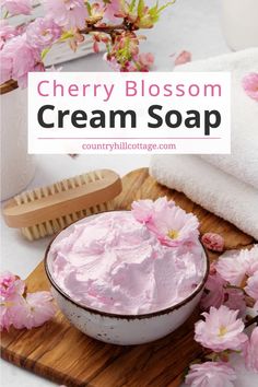 cherry blossom cream soap in a bowl with pink flowers