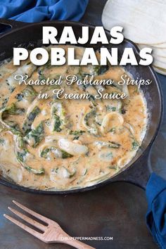 a skillet filled with chicken and spinach covered in cream sauce next to tortilla shells