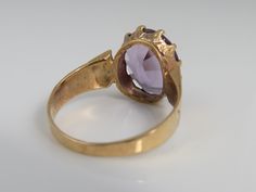 Estate 14k rose gold amethyst ring size 5. a 10mm amethyst stone. great shape. no chips or damage. 2.8 grams. Victorian Amethyst Ring With Center Stone In Gold, Victorian Gold Amethyst Ring With Center Stone, Gold Amethyst Ring, Fine Jewelry Collectible, Gold Amethyst Ring Collectible Fine Jewelry, Gold Amethyst Ring Fine Jewelry Collectible, Gold Amethyst Ring In Fine Jewelry Style, Gold Amethyst Ring For Collectors, Antique Oval Amethyst Multi-stone Ring, Antique Gold 14k Gold Amethyst Ring