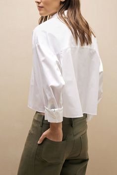 The soon to be ex is cut from superfine cotton. this shirt is cropped perfectly to meet the top of your pants and features a single pocket.    100% superfine cotton Classic Cropped Shirt With Pockets For Spring, Casual Cropped Shirt With Button Cuffs, Chic Cropped Shirt With Pockets For Work, Cotton Cropped Shirt With Button Cuffs, Effortless Cotton Workwear Top, Cotton Cropped Shirt With Button Cuffs For Spring, Effortless Cotton Tops For Work, Chic Cotton Tops With Cuffed Sleeves, Chic Cotton Top With Cuffed Sleeves