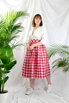 "Red check high waist full gathered skirt. Perfect for casual outfits and special ocasions with pair of trainters or high heels. 100% cotton.  Elastic at the back of waist.  Two side pockets. Midi lenght about 70cm + 5 cm waistband. Handmade in UK.  Model wears size S.  HOW TO CHOOSE A SIZE ?   Using a measuring tape, measure the smallest part of your waist.  SIZE CHART: (CM) XS - W: 66 CM S - W: 70 CM M - W: 74 CM  L - W: 78 CM  XL - W: 82 CM  CARE INSTRUCTIONS: Hand wash only, do not bleach, hang dry, do not tumble dry, press with a cool iron on the reverse side.  Please message me before purchasing so I can check availability. If you wish this skirt in any other fabric, shorter or longer \"send message to seller\" and we can try to make something especially for you. *Depends on computer Gingham Skirt For Day Out In Spring, Spring Gingham Skirt For Day Out, Plaid Long Cotton Skirt, Plaid Cotton Long Skirt, Gingham Gathered Skirt Bottoms For Spring, Long Plaid Cotton Skirt, Gingham Skirt For Summer Picnic, Summer Plaid Pleated Skirt, Gingham Gathered Skirt For Spring