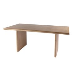 a wooden table sitting on top of a white floor