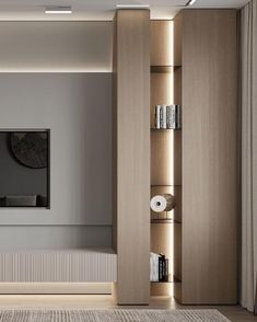 a living room with bookshelves and a television on the wall in front of it