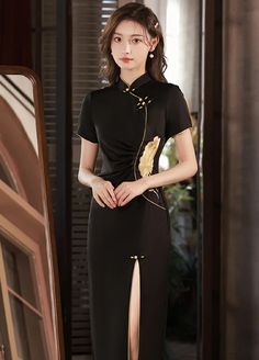 Look fabulous in a Black Embroidered Qipao Dress full of glamour. Shop this exquisite Chinese dress with intricate embroidery and captivating black color. Elegant Black Short Sleeve Cheongsam, Elegant Fitted Gold Ao Dai, Elegant Gold Fitted Ao Dai, Elegant Gold Ao Dai, Vestidos Satin, Black Qipao, Modern Qipao Dress, Embroider Flower, Heels Accessories