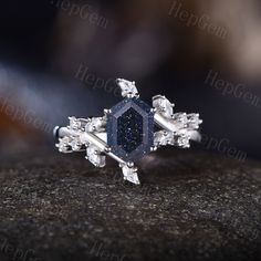 Longe Hexagon Galaxy Blue Sandstone Leaf Engagement Ring,Silver White Gold Moissanite Ring,Natural Inspired Bridal Ring,Galaxy Jewelry Gift Blue Sandstone looks black when you see it from a distance. When you look closely at it, you will see countless blue-purple grains on it. Blue Sandstone is a gemstone that has the meaning and properties of improving money luck. It holds the power to lead the business of the owner to success. It is also recommended when the owner aims to expand assets. It is Black Sandstone Ring, Black Sandstone Engagement Ring, Constellation Engagement Ring, Blue Goldstone Engagement Ring, Blue Sandstone Engagement Ring Silver, Galaxy Ring Engagement, Blue Sandstone Wedding Ring, Silver Octagon Crystal Promise Ring, Silver Diamond Hexagon Jewelry