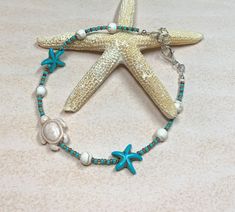 "Cute beachy boho summer anklet created using a white howlite Turtle as the focal bead. The rest of the anklet is made up with white round howlite stone beads, turquoise howlite starfish beads, and Czech glass seed beads. Anklet closes with a lobster clasp, and is adjustable with a 1\" extender chain. Anklet measures 9\" to 10\" with the extender chain. Thank you for shopping with The Lucie Collection!" Beads Anklet, Starfish Anklets, Beaded Ankle Bracelets, Vintage Inspired Earrings, Bohemian Style Jewelry, Beaded Ankle, Summer Anklets, Rustic Earrings, Anklets Boho