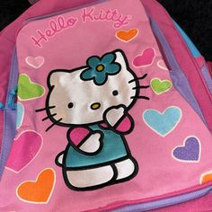 2003 Hello Kitty Backpack, One Zippered Pocket In The Front, Satin Hello Kitty With Multi Color Hearts As Background, Adjustable Straps, Two Side Pockets. See Pics / Vid For Better Description And Approx Measurements. Dm If You Have Any Questions. Back To School. All Offers Will Be Considered. Monster High Care Bears Betty Boop Adventure Time #Hellokitty #Sanrio #Strawberryshortcake #Powerpuffgirls #Y2k Pink Kawaii Backpack With Cute Design, Kawaii Pink Backpack With Cute Design, Pink Backpack With Cat Design For Daily Use, Pink Cat Design Backpack For Daily Use, Pink Student Backpack With Cute Design, Student Backpack With Cute Design In Pink, Pink Hello Kitty School Backpack, Pink Backpack With Cat Design For Students, Casual Pink Backpack With Cute Design