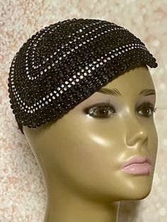 Simple, yet elegant. Black Beaded Fascinator half hat trimmed with rhinestones, and hat pin. The hat pin is for decorative purposes only. The hat is affixed to the head via a hatstring. The hat measures approximately 9.75 in X 6.75 inches at its widest parts. PLEASE NOTE All items for Free Shipping will be shipped via USPS First Class Mail. Gifts for mom, sister, wife, or yourself. Elegant Rhinestone Headband For Party, Gatsby Style Headband Hat For Evening, Elegant Evening Headband With Rhinestones, Elegant Mini Hats With Rhinestones For Weddings, Evening Flapper Adjustable Fascinator, Evening Flapper Style Adjustable Fascinator, Elegant Black Beaded Hat, Elegant Bead Cap Headband, Evening Headband With Rhinestones