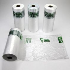 four rolls of white paper sitting next to each other