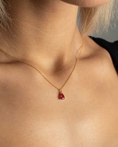 💎 Complete your elegance with the tiny ruby necklace. 💎 Dainty Ruby Necklace is suitable for everyday use. You can combine it with your other necklaces. 💎 If you want as a chooker, choose 12-14 inches. If you have a special chain length feel free to contact me. 💎 It is also great as a special gift to your loved ones. We do gift wrapping for you. If you have a note, we write it. 💎TECHNICAL INFORMATION💎 - Pendant heigh:10 mm - Pendant width: 5 mm - Chain length: 12-14-16-18-20-22-24 -26 inch Dainty Ruby Jewelry, Minimalist Red Gemstone Birthstone Necklace, Minimalist Red Birthstone Necklace, Ruby Teardrop Pendant Necklace As Gift, Red Birthstone Pendant Necklace, Red Dainty Birthstone Necklace, Red Ruby Birthstone Necklace Gift, Red Ruby Gemstone Birthstone Necklace, Red Teardrop Necklace For Valentine's Day