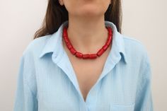 This is a gorgeous, handmade chunky coral necklace made with all-natural cylinder-shaped coral beads. This necklace is made of the most amazing shade of red coral beads that will go beautifully with many outfits and occasions.  The coral beads are approximately 20x11mm but vary due to the irregular shaping.  **Do not use liquid chemicals on the beads, just use a polishing cloth** Our items are shipped in a nice mesh pouch in a gift box. All jewelry needs to be returned unworn and in its original condition and packaging.  Earrings are NOT returnable for hygiene reasons. We hold the right to deny a return if the product you have sent back does not meet our requirements. You are responsible for the return shipping costs unless there has been a mistake on our end or an issue with the piece. If Beaded Necklace Outfit, Gold Schmuck, Mesh Pouch, Red Coral Necklace, Jewelry Summer, Looking Forward To Seeing You, Natural Coral, Coral Necklace, Cylinder Shape