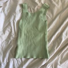 New Unworn Green Brandy Melville Knit Tank. Bought It But Ended Up Not Liking It And By The Time We Returned It It Was Too Late. Cute With Black Bottoms. Green Knit Tops For Loungewear, Green Knitted Cotton Tops, Green Cotton Knitted Tops, Fitted Knitted Tops For Loungewear, Trendy Green Knit Tank Top, Green Knit Tank Top For Fall, Trendy Green Pointelle Knit Top, Green Ribbed Knit Top For Spring, Green Ribbed Top For Loungewear