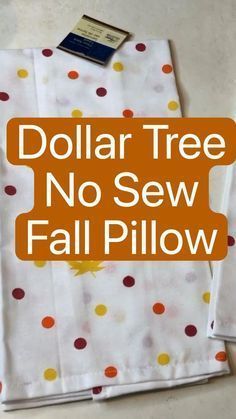 the dollar tree no sew fall pillow is on display with it's tag