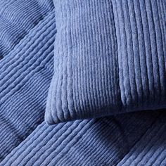 the texture of an upholstered mattress is shown