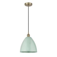 a brass and green glass pendant light fixture with a black cord hanging from the ceiling