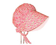 This sweet pink floral baby bonnet will look adorable on an infant, toddler and little girl, and it offers some shade from the sun with its wide brim. There is fabric at the back of the neck for added sun protection.  It will be cute for special occasions, and it's durable enough to wear daily in spring, summer and fall. Sweet for your own little girl, and a special handmade gift.  **This sun hat fits pretty true to the age of baby if she is of average size** I made this sunbonnet using breathab Newborn Sun Hat, Handmade Baby Gift, Girls Sun Hat, Handmade Baby Gifts, Hat Fits, Baby Sun Hat, Matching Baby, Baby Bonnet, Quality Hats